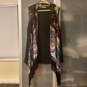 Long open front vest with fringe trim